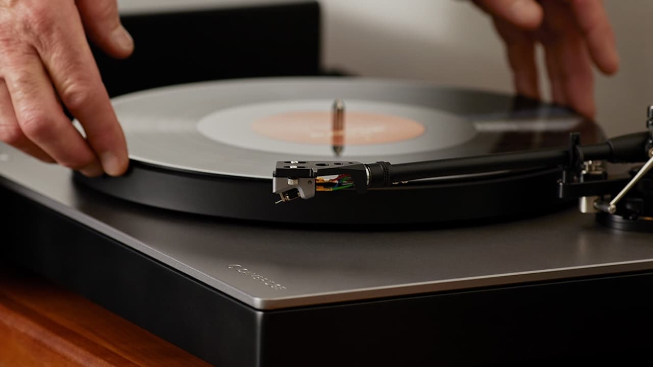 Placing Vinyl Record on Cambridge Audio Alva Turntable